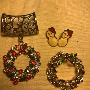 Pendant, earrings and lapel pin.